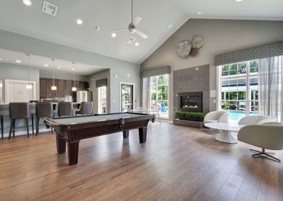High ceiling Den with pool table